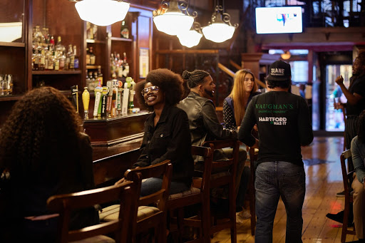 Socializing Inside Vaughan's Irish Pub