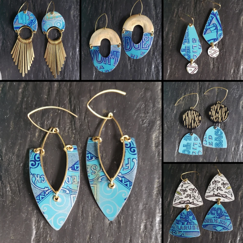 Six pairs of earrings that are shades of blue and gold.